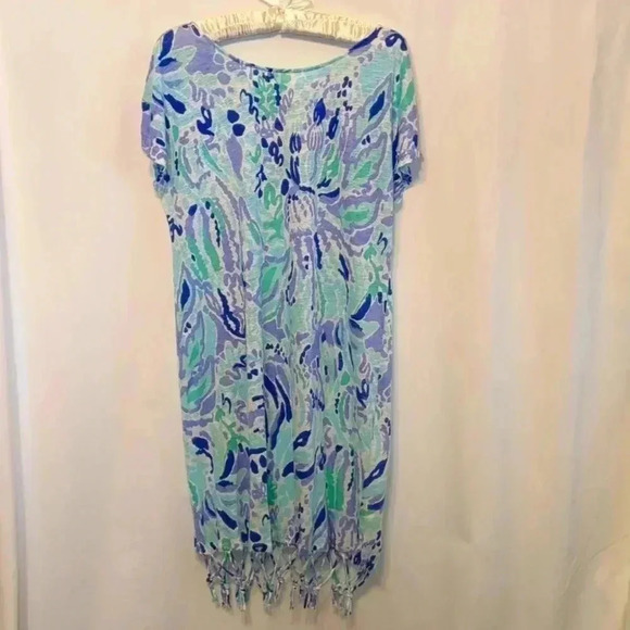 Lilly Pulitzer dress with unique hemline fringe and crisscross in back. Medium - Picture 1 of 6